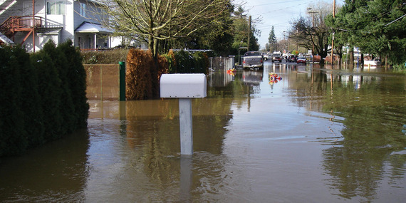 Flooded street with mailbox