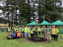 PPR - group of people standing in front of green tent 