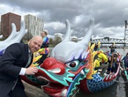 Councilor Green and the dragon boats at the waterfront