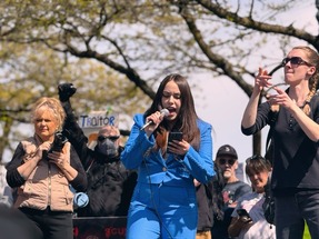 Councilor Morillo speaking in front of a crowd 