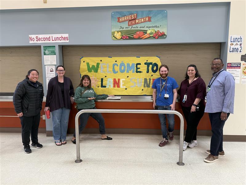 Councilor Koyama Lane with Lane Middle School Principal and SUN Staff