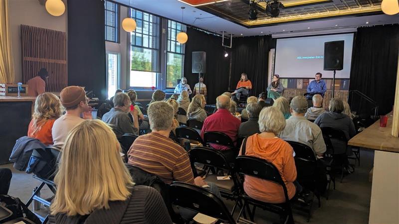 District 3 Councilors on a stage at a budget town hall