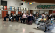Portlanders attend the District 2 Town Hall in the cafeteria at George Middle School