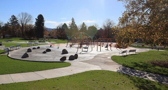 View of playground and splash pad