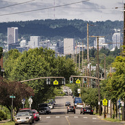 City street looking at downtown skyline in the distance