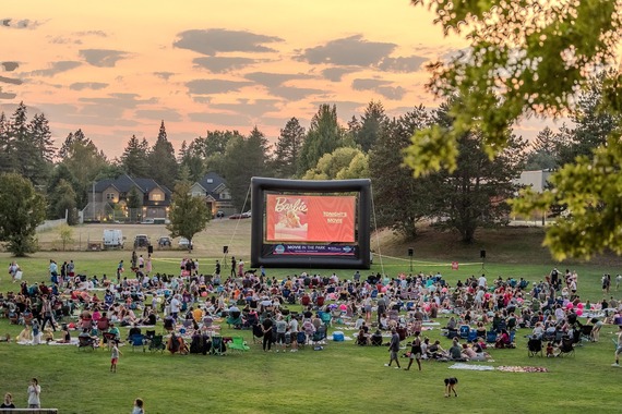 People gather to watch a movie in a Portland park on a gorgeous summer evening.