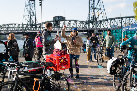 People on bikes converge on Waterfront Park to have fun together.