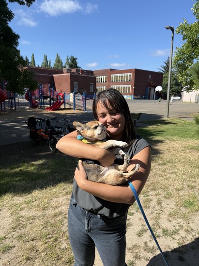 Councilor Koyama Lane with a Dog at Sunnyside Park at a Constituent Coffee