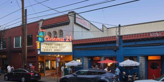 Cinema 21 marquee and surrounding businesses