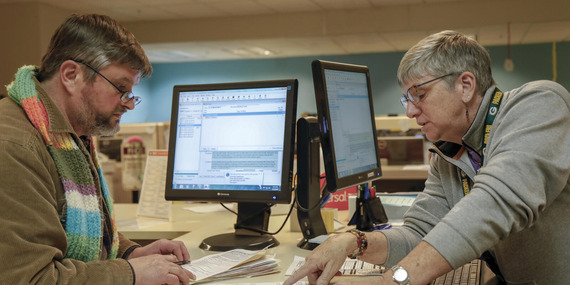 City permit official meeting with customer