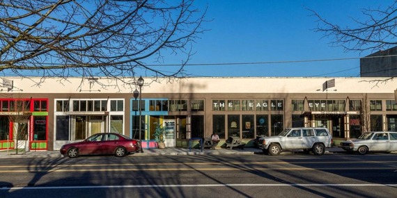 Storefronts along a busy street