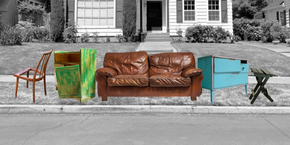 BPS - street view of house with furniture at curb for pickup
