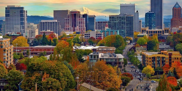 BPS - Portland skyline looking toward the east with trees in fall color and Mt. Hood in background