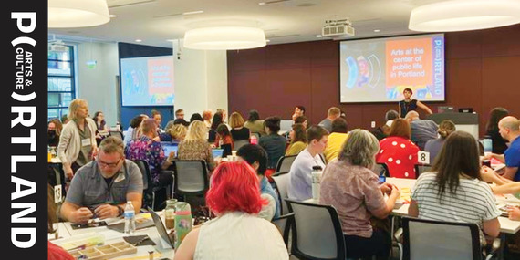 City of Portland's Arts Education Program Manager Dawn Isaacs at the front of a room full of Portland Public School educators