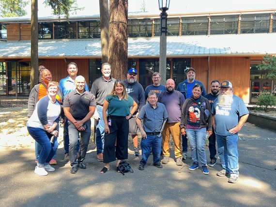 Group photo of smiling people, including Councilors Koyama Lane and Novick, outside of Mt. Scott Community Center