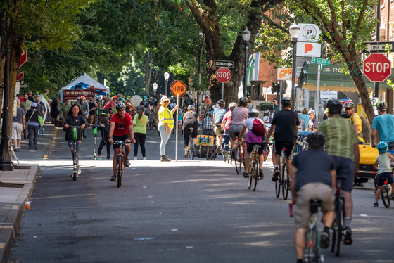 People walk and roll along SW Park Avenue in downtown Portland.