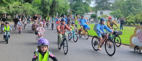 The Abernathy Bike Buses converging and ride around Ladd's Circle in the morning before biking the final stretch to school.