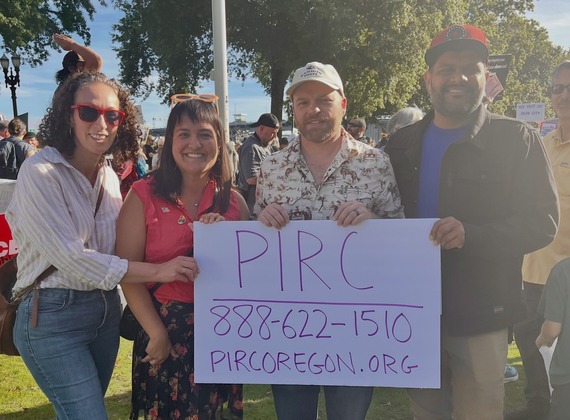 Councilors Pirtle-Guiney, Koyama Lane, Green and Kanal holding a sign with PIRC 888-622-1510 pircoregon.org written on it