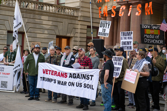 Councilor Mitch Green and veterans at City Hall