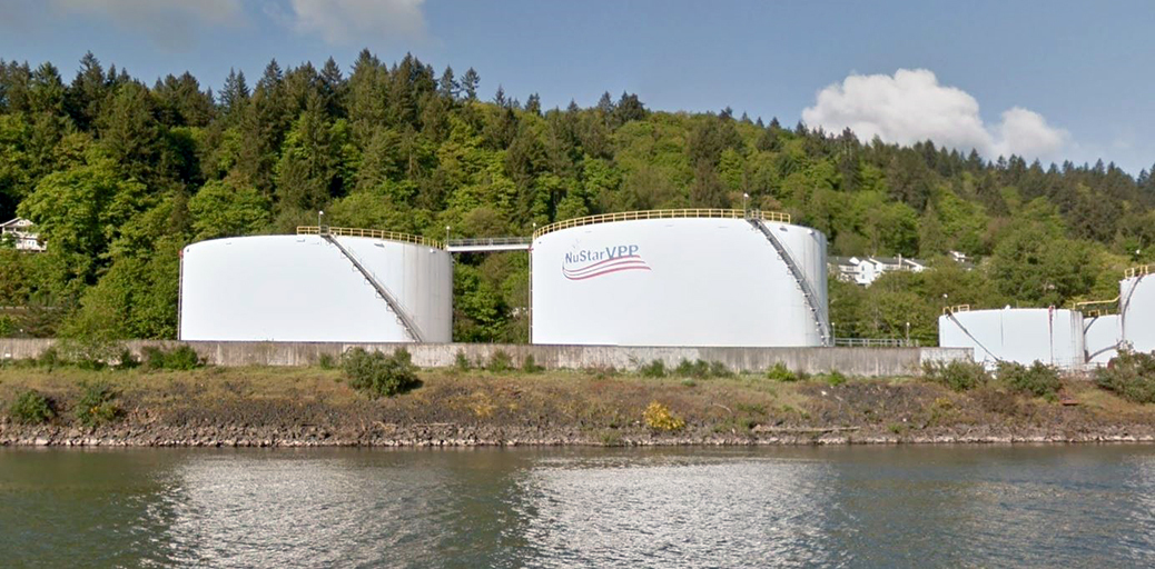 Critical Energy Infrastructure Hub photo shows two massive tanks next to a river - CEI Hub