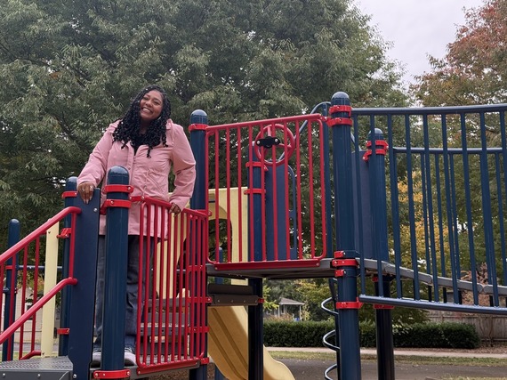 Councilor Avalos on play structure.