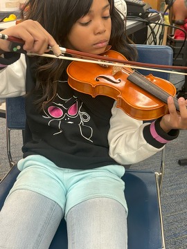 BRAVO Youth Orchestras partners with Portland Parks and Recreation SUN schools - young violin player