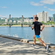 Eastbank Esplanade runner shows Willamette River in background - central city code amendment project
