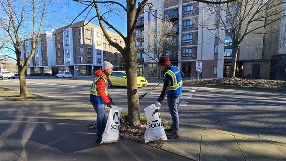 SOLVE volunteers cleaning up litter in Albina, along MLK