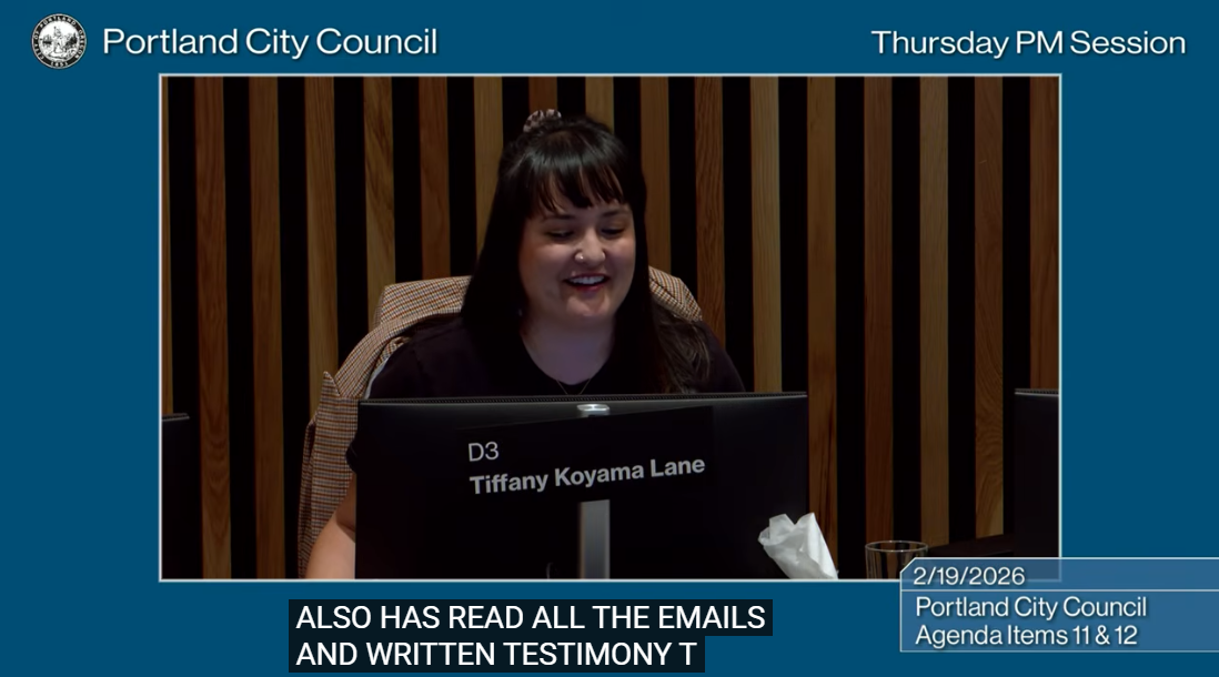 Screenshot of Thursday PM Session City Council meeting showing Councilor Koyama Lane speaking at the dais