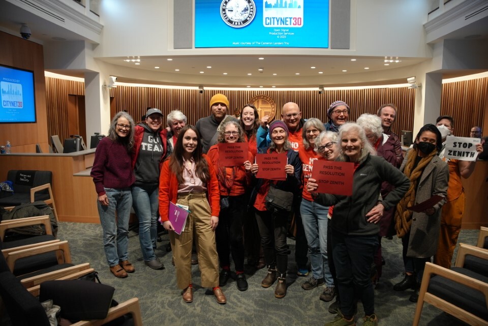 Supporters of the Zenith resolution in City Hall in 2025