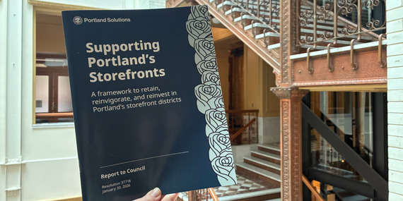 A physical copy of the Supporting Portland’s Storefronts draft report, which is headed for a full council vote.