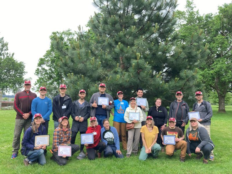 PPR - Group of people posing in front of tree