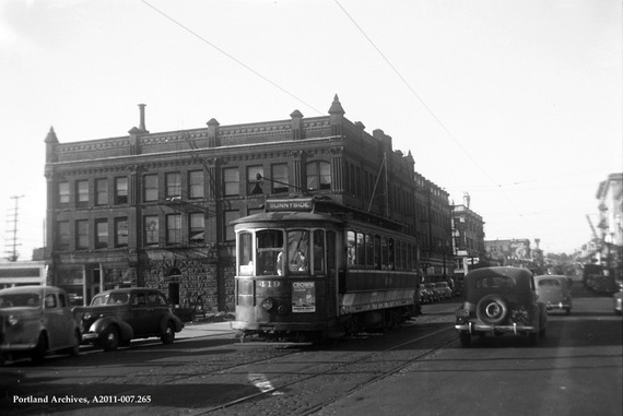 Black and white photo of an old street car on a Portland street in 1946