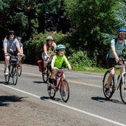 Sunday Parkways has children and parents bicycling on closed city streets
