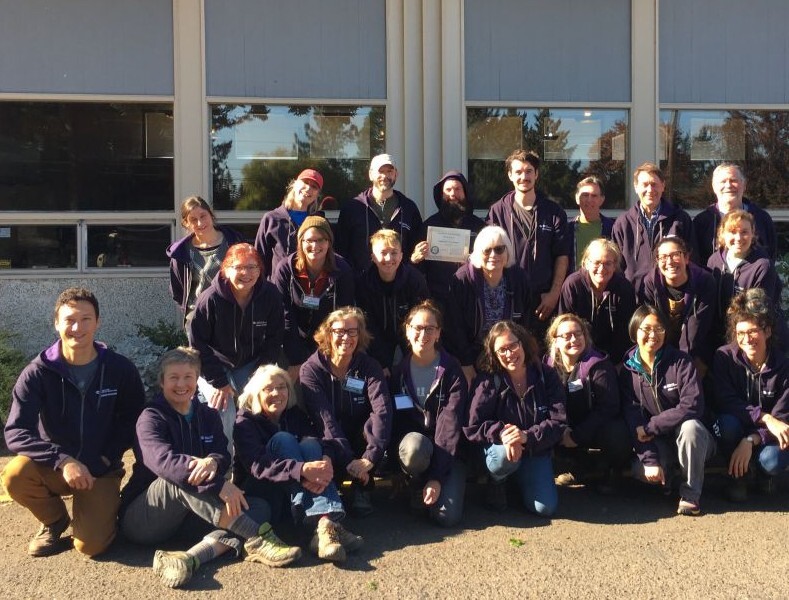 PPR - Group of people posing in purple sweatshirts