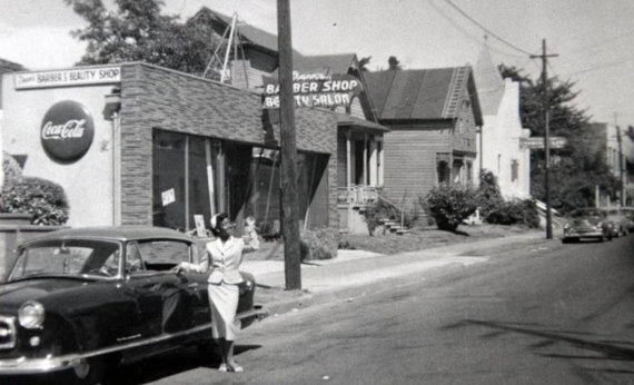 Legacy business program black and white photo shows Dean's Beauty Salon and Barber