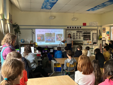 Teacher Tiffany describing her Japanese heritage to Grout Elementary students 