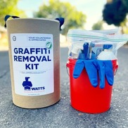 Graffiti removal kit shows a can with gloves