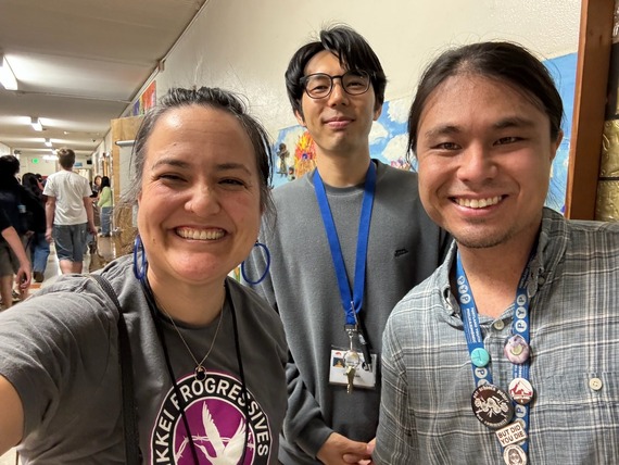Councilor Koyama Lane in hallway with two Mount Tabor Middle School teachers
