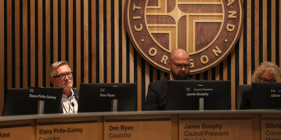 Councilors Ryan, Dunphy, and Clark on the dais during 2026-27 budget amendment deliberations.