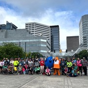 City Bike Bus group photo with mascots Drippy and Coney