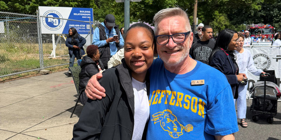 Summer intern Kobi Flowers and Councilor Dan Ryan at the 2026 Good in the Hood festival. 