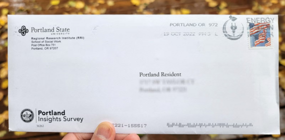Envelope with the Portland Insights Survey logo and a stamp addressed to "Portland Resident"