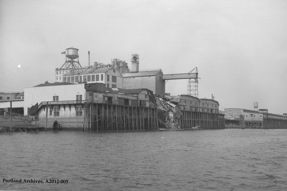 City Archives photo of Centennial Mills building from 1965 shows black and white image.