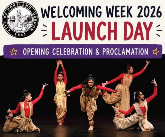 Classical Indian dancers in traditional, deep red, clothing for Welcoming Week