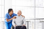 nursing assistant with older patient