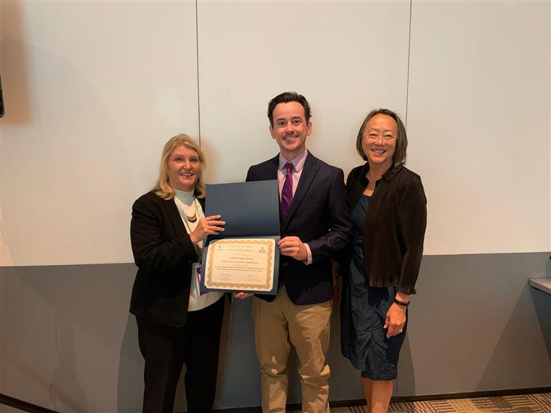 Principal Auditor Casey Kopcho and Deputy Secretary of State Cheryl Myers receiving the NCSL Notable Document Award for Public Safety