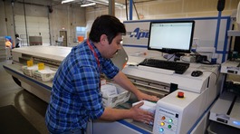 Election worker arranging ballots envelopes. 