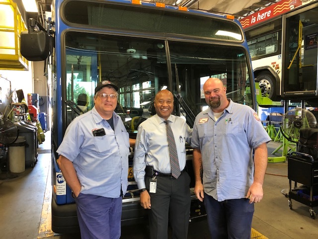 TriMet General Manager Sam Desue, Jr., with Journeyman Mechanics Mike Francois (left) and Josh Stone (right) 