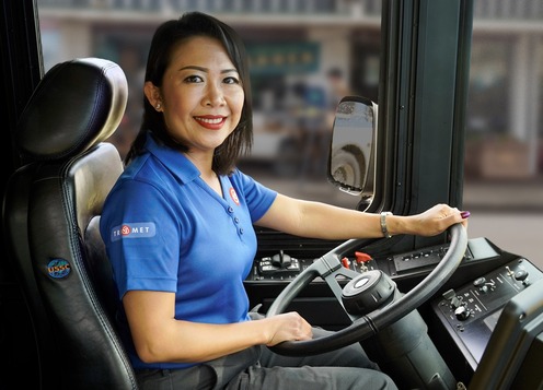 bus driver in seat woman poc